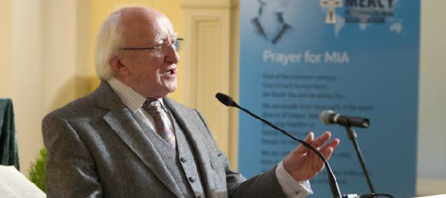 President Higgins addresses the assembled gathering